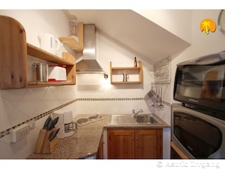 Apartment Cala Liberotto Kitchen 19