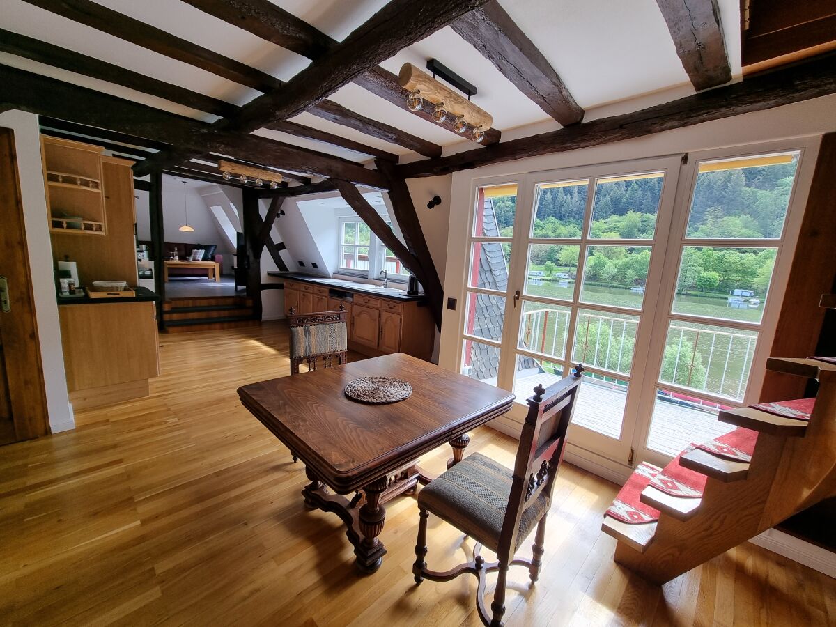 Dining table with Moselle view and terrace on the right