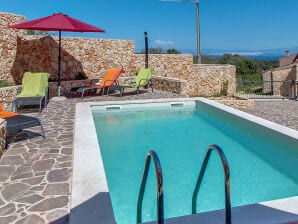 Ferienhaus DELPHINE mit Pool, Jacuzzi und Meerblick - Belej - image1