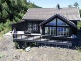 Terrasse und Wohnbereich mit Seeblick