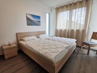 Schlafzimmer mit Doppelbett