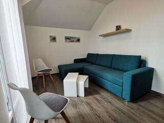 Schlafzimmer mit Bett-Couch