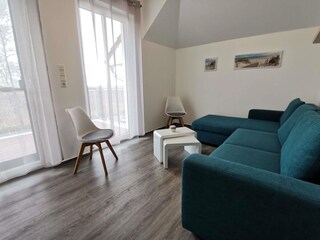 Schlafzimmer mit Bett-Couch