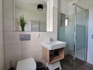 Badezimmer mit Dusche/WC