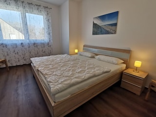Schlafzimmer 2 im 1. OG