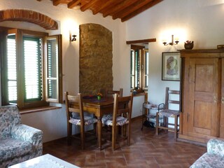 Wohnraum Camino, Esstisch mit Blick in die Kochecke