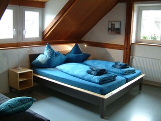 blaues 4-Bett- Zimmer