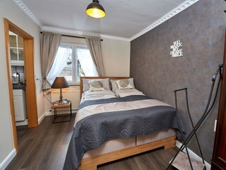 Burgstube Schlafzimmer mit Boxspringbett
