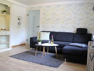 Wohnzimmer mit zusätzlicher Schlafcouch