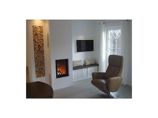 Wohnzimmer mit Kamin