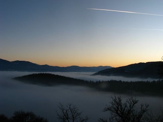 ... Setting sun & fog in the valley ...