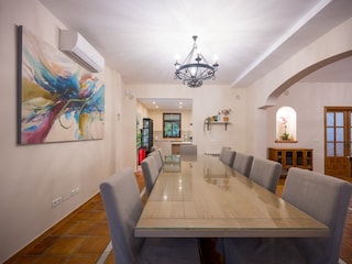 Dining area, wooden table for 12, exit to terrace