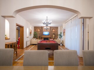 Homey atmosphere lounge area w wooden coffee table