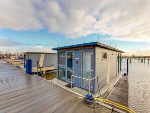 Huisboot Moderne woonboot in jachthaven van Volendam met zwembad - Katwoude - image1