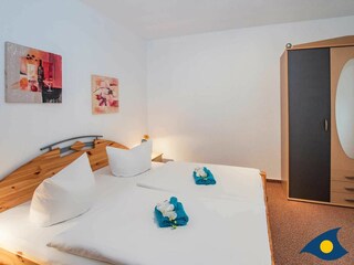 Schlafbereich mit Doppelbett