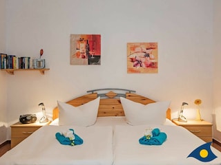 Schlafbereich mit Doppelbett