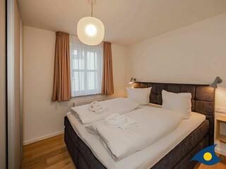 Schlafzimmer mit Doppelbett