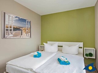 Schlafzimmer mit Doppelbett