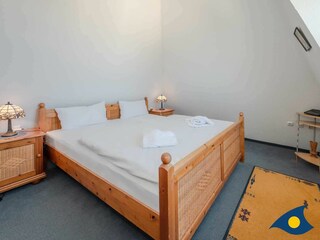 Schlafbereich mit Doppelbett