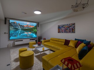 Nice and spacious Cinema room with a Projector