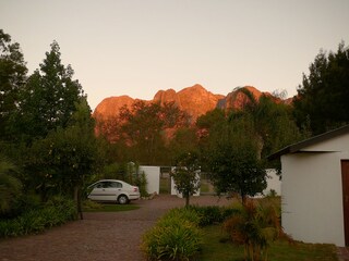 The mountains start to glow in the evening