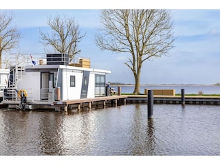 Maison flottante Uitwellingerga Environnement 29