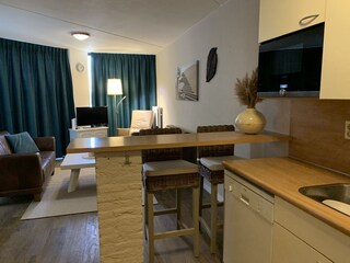 Kitchen with dishwasher and combi oven