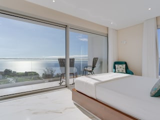 Schlafzimmer 4 mit Balkon und Meerblick