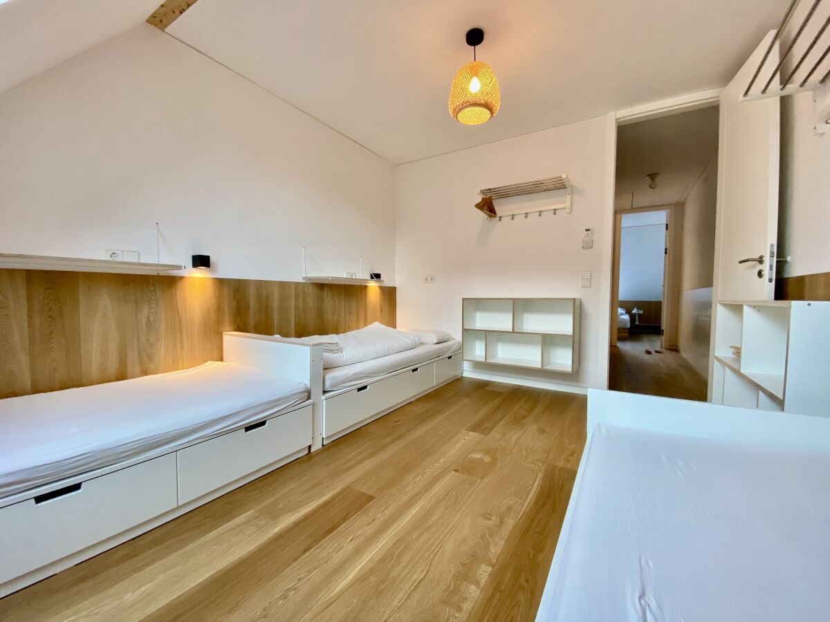 Schlafzimmer mit 3 Betten