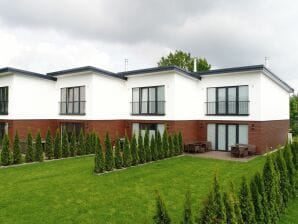 Maison de vacances Cottage dans un village baltique humide - vapeur - image1