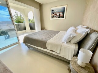 Masterbedroom with large terrace & sea view