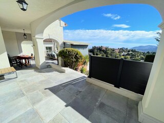 Large terrace with outdoor sofa at masterbedroom