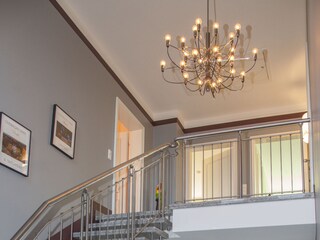 Spacious staircase into the sleeping area