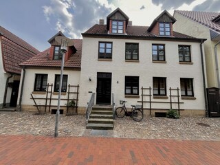 At the Provision House front