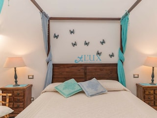 Schlafzimmer mit Doppelbett