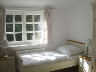 Schlafzimmer in der Ferienwohnung Gut Grasbeck