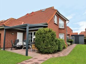 Holiday house Gerenoveerd halfvrijstaand huis met tuin en ideale ligging in Neßmersiel