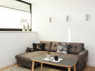Wohnbereich mit gemütlichem (Schlaf-)Sofa