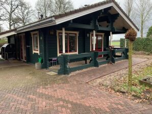 Vakantiehuis Finse chalet met privé tuin en houtgestookte sauna nabij de Veluwe - Hulshorst - image1