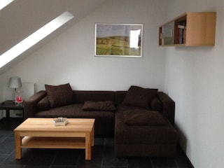 Wohnzimmer II im DG mit Schlafcouch