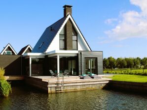 Vakantiehuis Rustgevende en luxe villa aan het water in Stavoren - Stavoren - image1