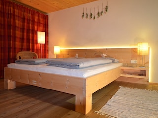 Bedroom with pine furniture