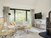 living room with wood-burning stove