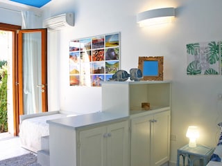 Schlafzimmer mit Ausgang zum Garten