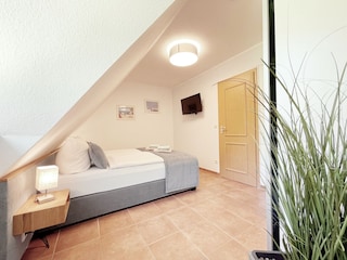 Schlafzimmer mit TV