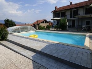 Attraktives Ferienhaus in Castellveccana mit privatem Pool - Porto Valtravaglia - image1