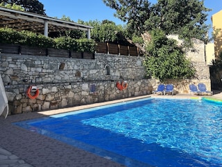 Pool and tavern next door
