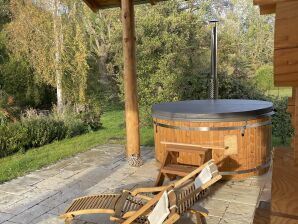 Ferienhaus Kuschelige Jägerstube mit Kamin & Hot Tube - Alt Schönau - image1