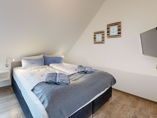 Schlafzimmer mit TV