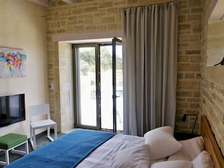 Schlafzimmer 1 von 3 mit AC, TV, Terrassenzugang